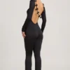 Eulalie Jumpsuit aus geschmeidigem Jersey mit Schleifendetail in Schwarz