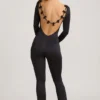 Eulalie Jumpsuit aus geschmeidigem Jersey mit Schleifendetail in Schwarz