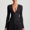 Fiorella Langarm-Plissee-Minikleid in Schwarz Fiorella Langarm-Plissee-Minikleid in Schwarz