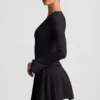 Fiorella Langarm-Plissee-Minikleid in Schwarz Fiorella Langarm-Plissee-Minikleid in Schwarz