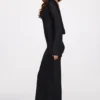 Frances transparentes Jersey-Maxikleid mit langen Ärmeln und rückenfreiem Ausschnitt in Schwarz