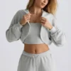 Gebrüster Jersey-Hoodie mit Kapuze in Nebelgrau Gebrüster Jersey-Hoodie mit Kapuze in Nebelgrau