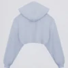 Gebrüster Jersey-Kapuzen-Shrug in Soft Blue