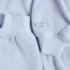 Gebrüster Jersey-Kapuzen-Shrug in Soft Blue