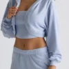 Gebrüster Jersey-Kapuzen-Shrug in Soft Blue