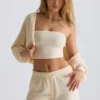 Gebürsteter Jersey-Cropped-Shrug mit Kapuze in Ecru Gebürsteter Jersey-Cropped-Shrug mit Kapuze in Ecru