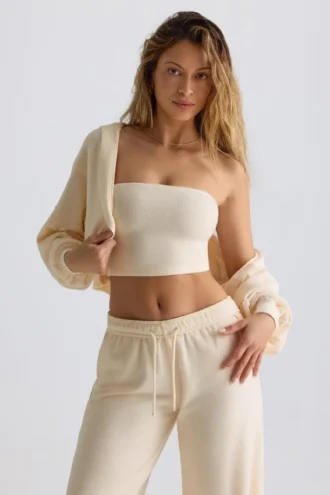 Gebürsteter Jersey-Cropped-Shrug mit Kapuze in Ecru