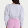 Geknöpfte, kurze Strickjacke aus gebürstetem Jersey in Grau meliert Geknöpfte, kurze Strickjacke aus gebürstetem Jersey in Grau meliert