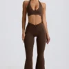 Geraffte, ausgestellte Hose aus gebürstetem Jersey in Pecan-Mélange Geraffte, ausgestellte Hose aus gebürstetem Jersey in Pecan-Mélange