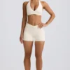 Geraffte Mini-Shorts in Elfenbein-Mélange