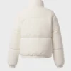 Gesteppte Pufferjacke aus Cord in Elfenbein Gesteppte Pufferjacke aus Cord in Elfenbein