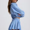 Gestreifte Plissee-Shorts aus Baumwollpopeline in Blau Gestreifte Plissee-Shorts aus Baumwollpopeline in Blau