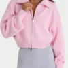 Gestreiftes, kurzes Sweatshirt mit Reißverschluss in Hellrosa
