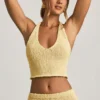 Gianna Bouclé-Crop-Top mit Neckholder in Gelb