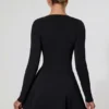 Graciela Minikleid mit Schleifendetail, tiefem Ausschnitt und A-Linien-Schnitt in Schwarz