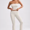 Grob gestrickte Kick-Flare-Hose mit Umschlag in Creme Grob gestrickte Kick-Flare-Hose mit Umschlag in Creme