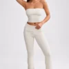 Grob gestrickte Kick-Flare-Hose mit Umschlag in Creme Grob gestrickte Kick-Flare-Hose mit Umschlag in Creme