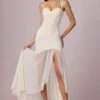 Haruna Asymmetrisches Korsettkleid mit Rüschen in Elfenbein Haruna Asymmetrisches Korsettkleid mit Rüschen in Elfenbein
