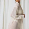 Hiva Oversize-Shirt mit Perlenverzierung in Perlweiß Hiva Oversize-Shirt mit Perlenverzierung in Perlweiß