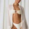 Hiva Oversize-Shirt mit Perlenverzierung in Perlweiß Hiva Oversize-Shirt mit Perlenverzierung in Perlweiß