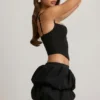 Imani Minirock mit mehrlagigem Bubble-Saum und mittlerer Leibhöhe in Schwarz Imani Minirock mit mehrlagigem Bubble-Saum und mittlerer Leibhöhe in Schwarz