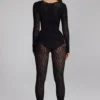 Irina Langarm-Jumpsuit aus nahtlosem Strick in Schwarz Irina Langarm-Jumpsuit aus nahtlosem Strick in Schwarz