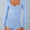 Ismera Strick-Strampler mit langen Ärmeln in zartem Blau Ismera Strick-Strampler mit langen Ärmeln in zartem Blau