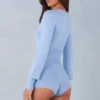 Ismera Strick-Strampler mit langen Ärmeln in zartem Blau Ismera Strick-Strampler mit langen Ärmeln in zartem Blau