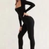 Jett Langarm-Jumpsuit mit quadratischem Ausschnitt in Schwarz Jett Langarm-Jumpsuit mit quadratischem Ausschnitt in Schwarz