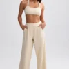 Jogginghose aus Frottee mit weitem Bein in Creme Jogginghose aus Frottee mit weitem Bein in Creme
