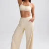 Jogginghose aus Frottee mit weitem Bein in Creme Jogginghose aus Frottee mit weitem Bein in Creme