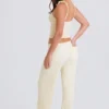 Jogginghose aus geripptem Strick mit weitem Bein in Creme Jogginghose aus geripptem Strick mit weitem Bein in Creme
