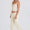Jogginghose aus geripptem Strick mit weitem Bein in Creme Jogginghose aus geripptem Strick mit weitem Bein in Creme