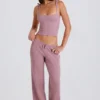 Jogginghose aus geripptem Strick mit weitem Bein in Mauve Jogginghose aus geripptem Strick mit weitem Bein in Mauve