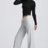 Jogginghose mit niedriger Leibhöhe und weitem Bein in Grau meliert Jogginghose mit niedriger Leibhöhe und weitem Bein in Grau meliert