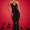 Kassie Verziertes Neckholder-Kleid mit Cut-outs in Schwarz Kassie Verziertes Neckholder-Kleid mit Cut-outs in Schwarz