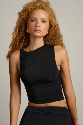Kirbie Asymmetrisches Tanktop mit Rüschen in Schwarz