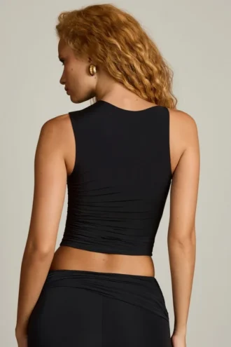 Kirbie Asymmetrisches Tanktop mit Rüschen in Schwarz