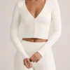 Kiva Modal-Strickjacke mit Rippbündchen in Weiß Kiva Modal-Strickjacke mit Rippbündchen in Weiß