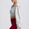Kürzliches Sweatshirt mit Viertelreißverschluss in Grau meliert Kürzliches Sweatshirt mit Viertelreißverschluss in Grau meliert