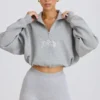Kürzliches Sweatshirt mit Viertelreißverschluss in Grau meliert Kürzliches Sweatshirt mit Viertelreißverschluss in Grau meliert