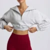 Kürzliches Sweatshirt mit Viertelreißverschluss in Grau meliert Kürzliches Sweatshirt mit Viertelreißverschluss in Grau meliert