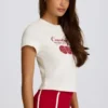Kürzliches T-Shirt mit Grafikprint in Elfenbein Kürzliches T-Shirt mit Grafikprint in Elfenbein