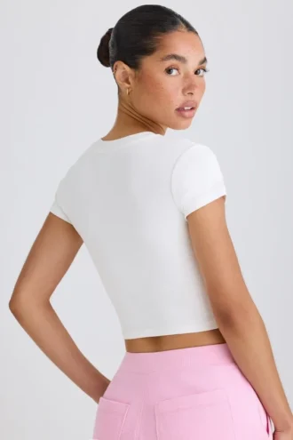 Kurzes T-Shirt aus Stretch-Baumwolljersey mit Grafikprint in Weiß