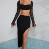 La Desirade Crop-Top mit verziertem Wasserfallausschnitt in Schwarz