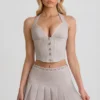 Laika Minirock mit Plissee und niedriger Taille in Ecru