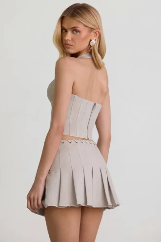 Laika Minirock mit Plissee und niedriger Taille in Ecru Laika Minirock mit Plissee und niedriger Taille in Ecru