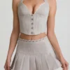 Laika Minirock mit Plissee und niedriger Taille in Ecru