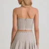 Laika Minirock mit Plissee und niedriger Taille in Ecru