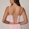 Letitia verziertes Schnür-Korsett-Oberteil in zartem Rosa Letitia verziertes Schnür-Korsett-Oberteil in zartem Rosa